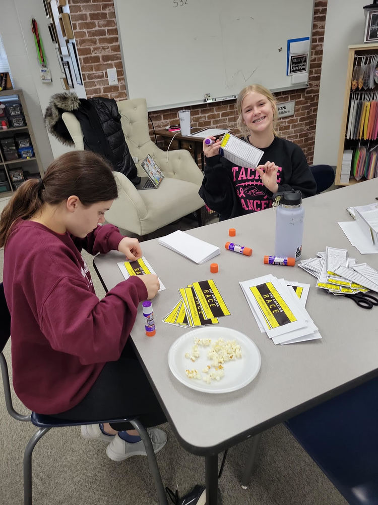 Students preparing for Family Game Night