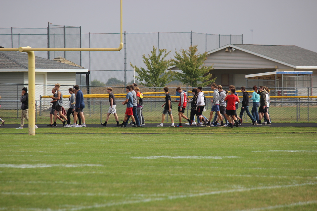 HS students walking on the track