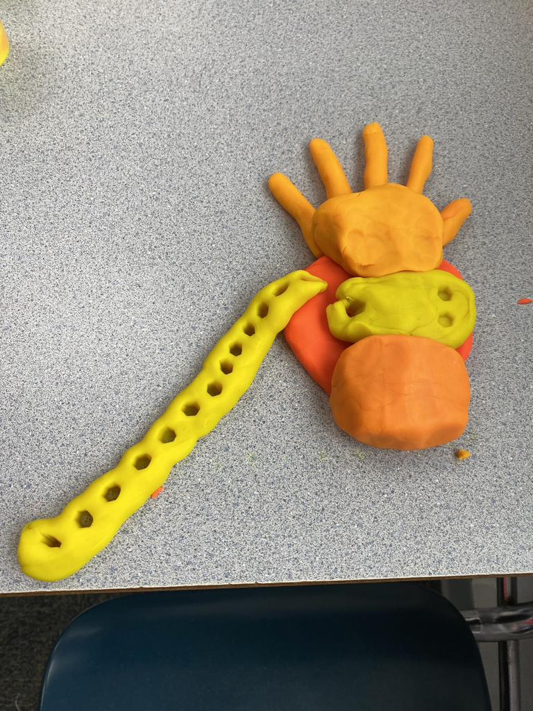 Students working with play dough