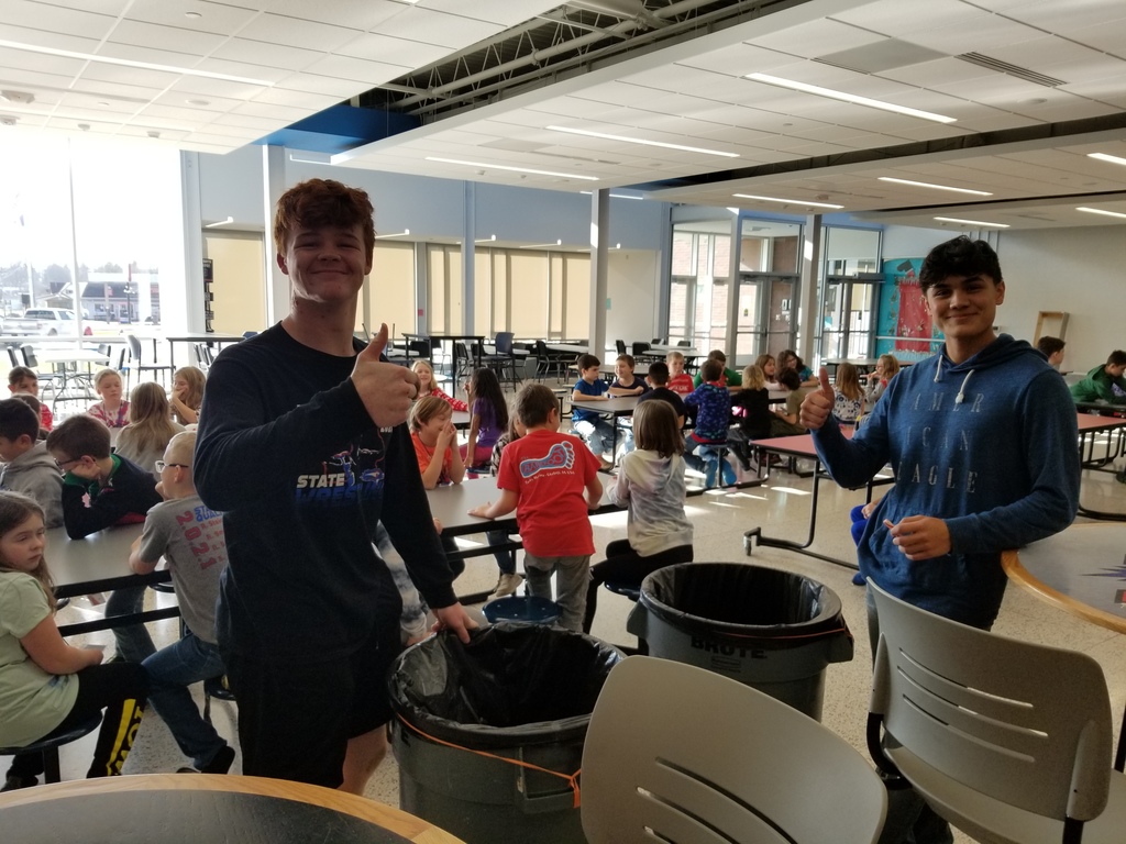 Chase and Colton helping in the lunch room 